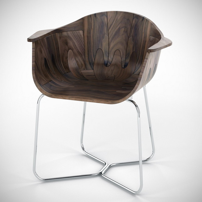 Английский дизайнер Тони О'Нилла (Tony O’Neill) разработал и создал удивительно стильное кресло из древесины грецкого ореха, названное им "Walnut Shell Seat".